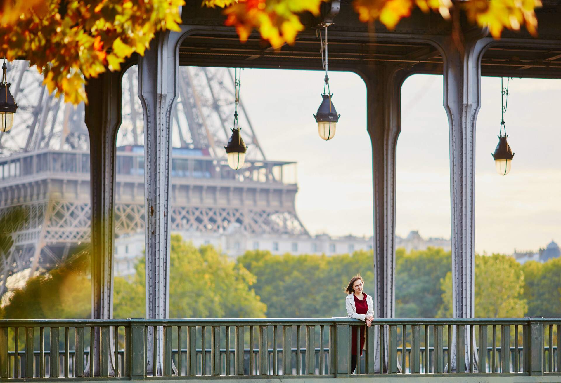 Beautiful young woman in Paris on a bright fall day; Shutterstock ID 724648627; Purpose: ; Brand (KAYAK, Momondo, Any):