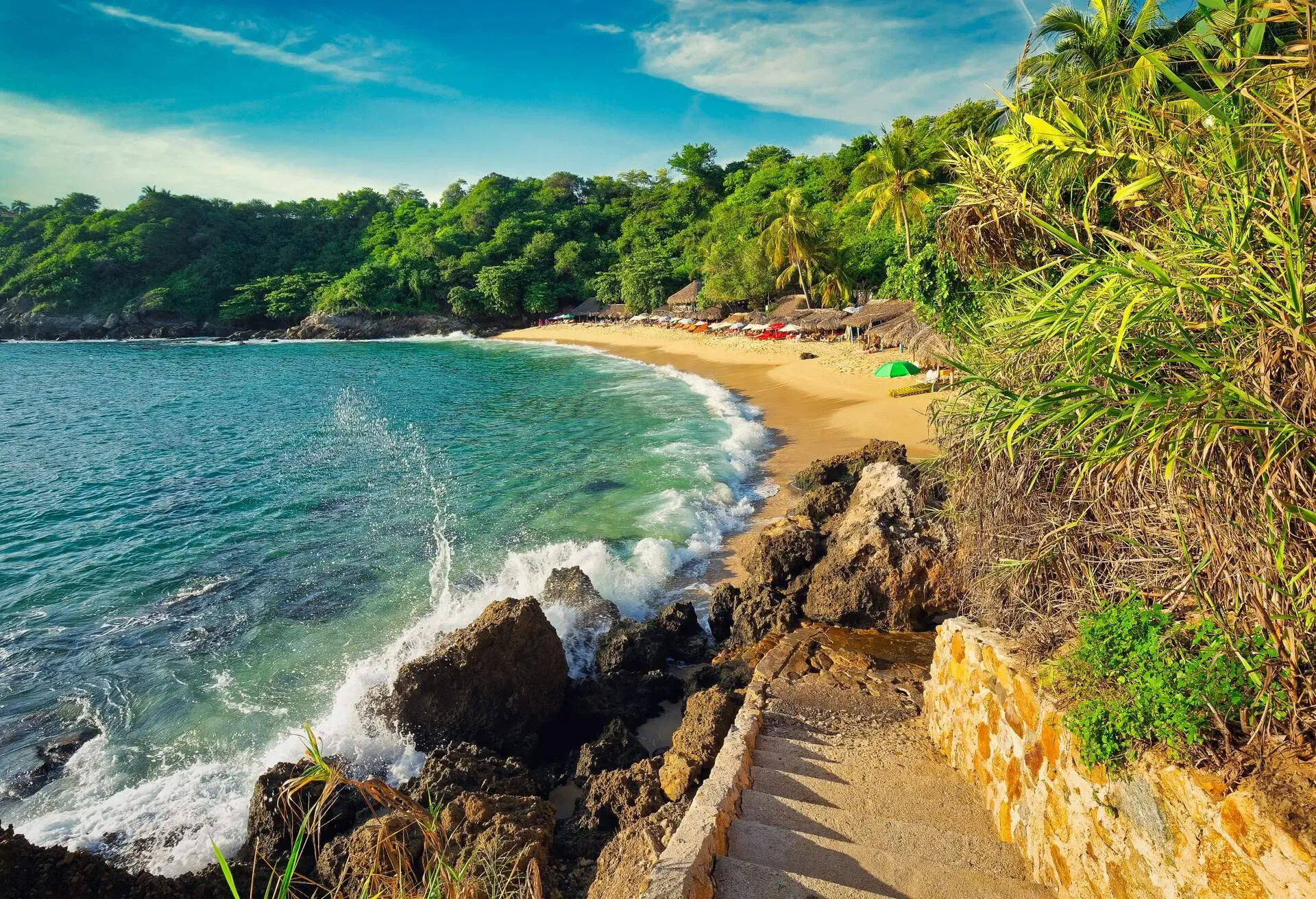 sunset shot of beautiful Playa Carizalillo beach in Puerto Escondido (Oaxaca State, Mexico) on  the pacific ocean coast